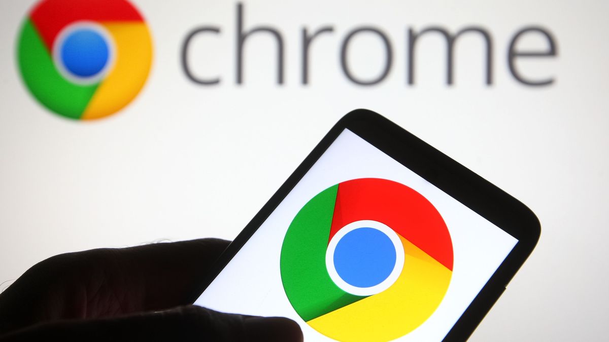 Chrome browser on phone with Chrome logo in the background