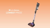 Shark Stratos cordless vacuum on an orange background