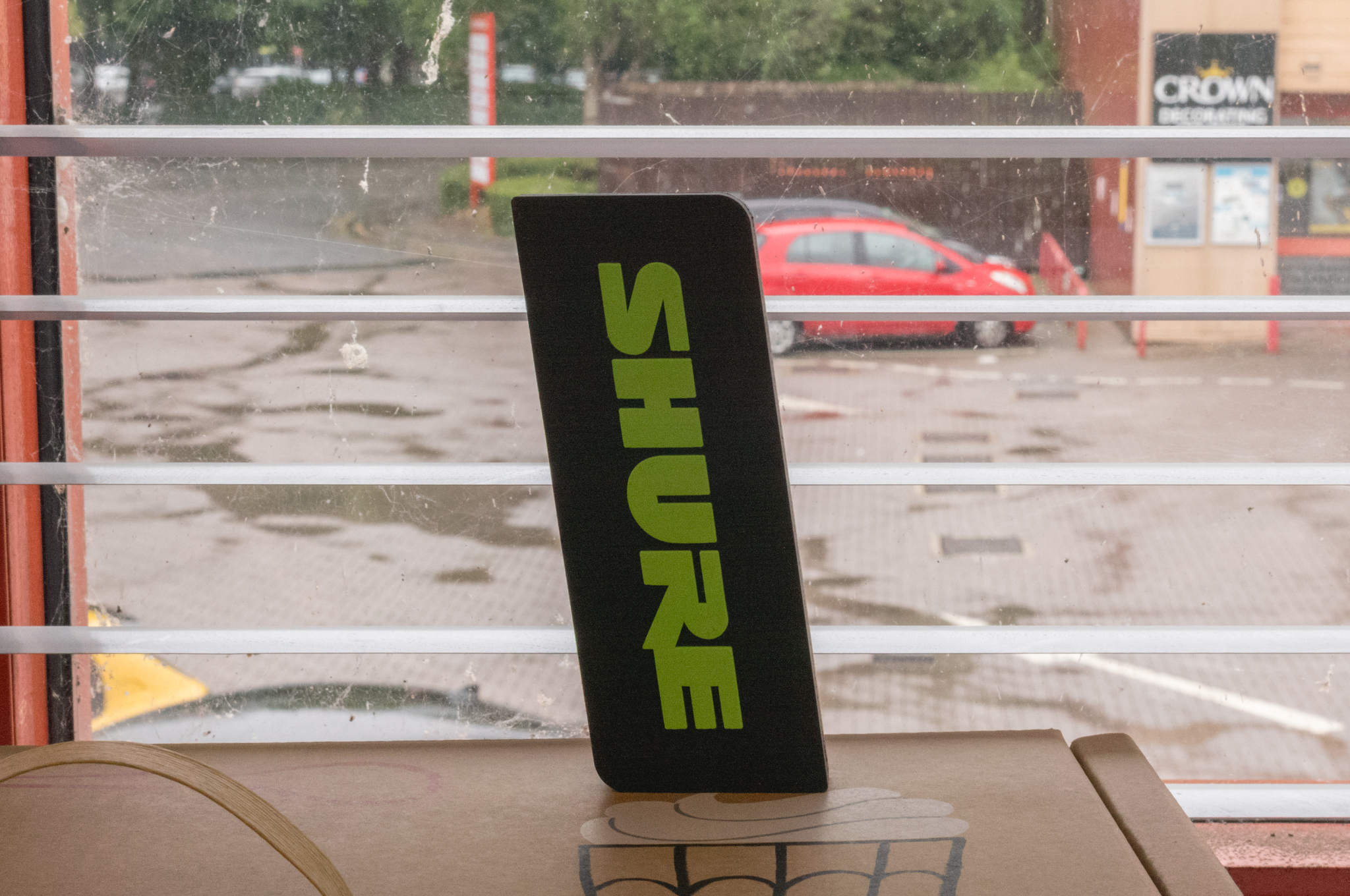 A photo of a Shure trinket taken on a Leica M11-D rangefinder camera