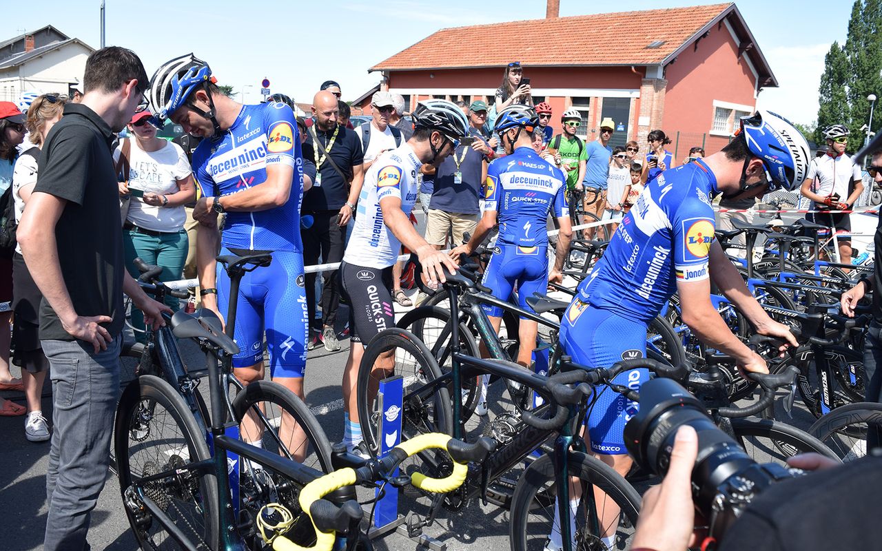 Deceuninck-QuickStep riders collect their Specialized Creo electric road bikes ahead of a training ride