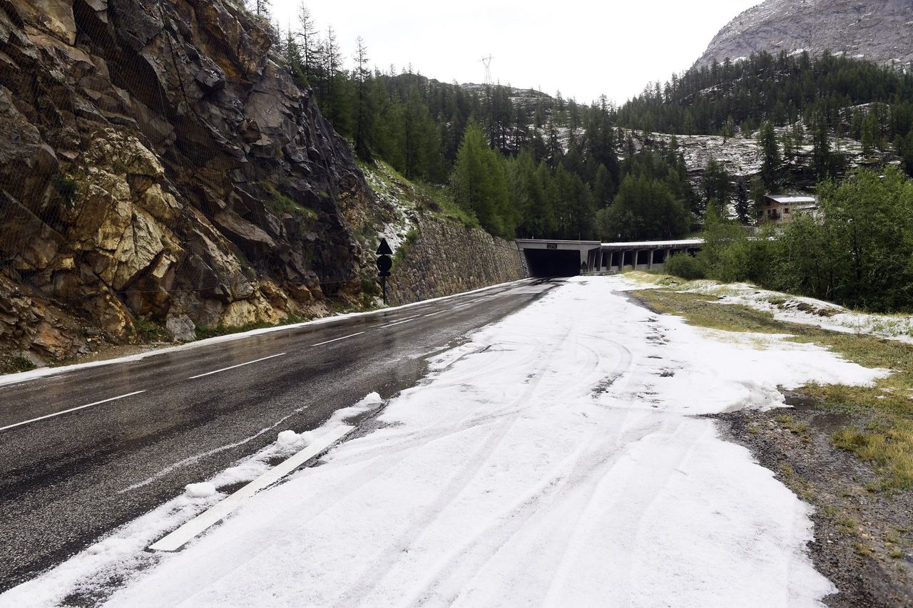 A storm forced the race organisers to end the stage at the summit of the Col de I'Iseran