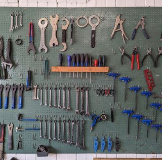 Image of workshop tools on a wall