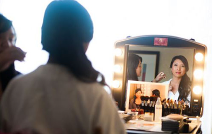 Woman sat in front of mirror, Perfect 10 Black Label