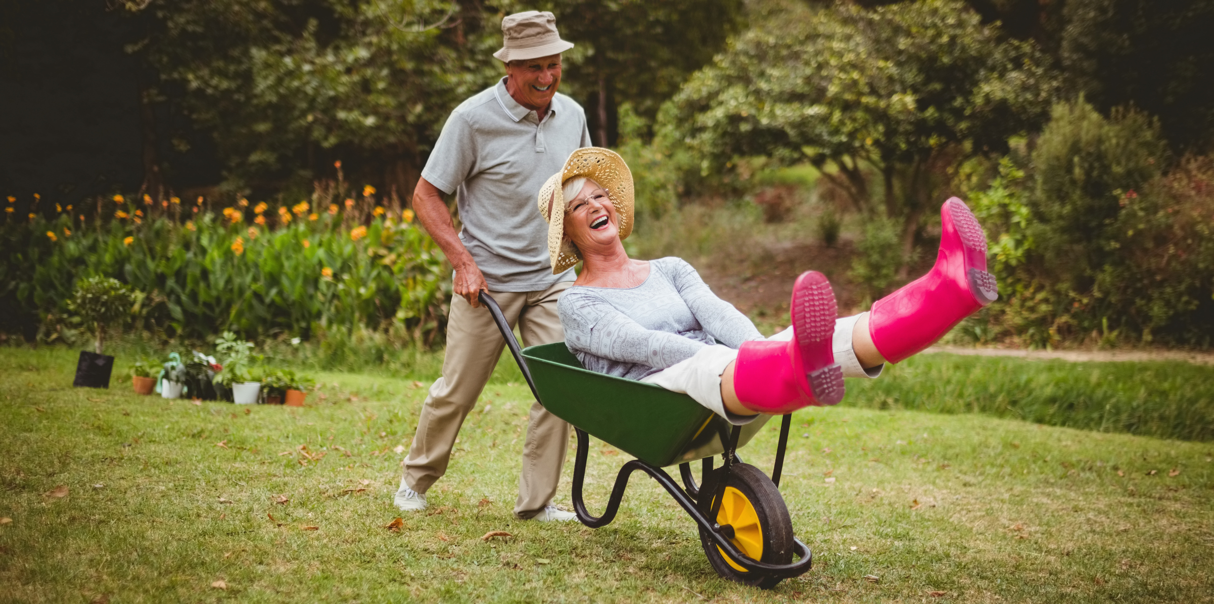 Older couple having fun in the garden