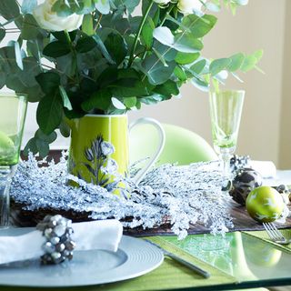 christmas table setting with botanical jug