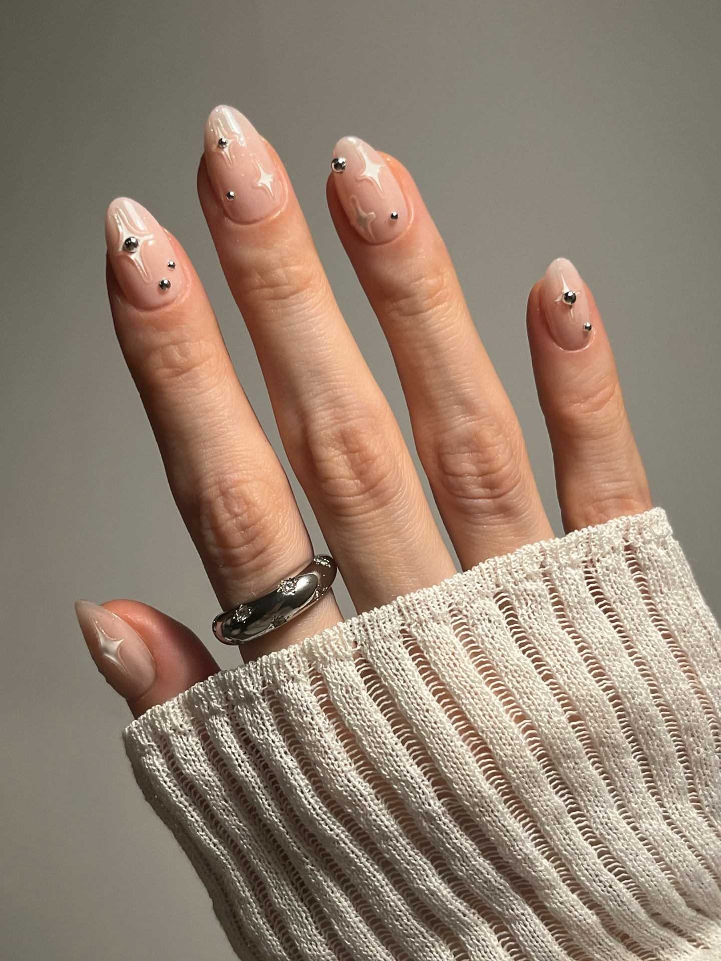 @pink_oblivion neutral star nail design