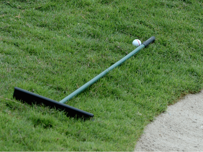 Rules Of Golf Ball Resting Against A Rake Golf Monthly