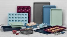 KitchenAid colored bakeware in various shades on kitchen counter