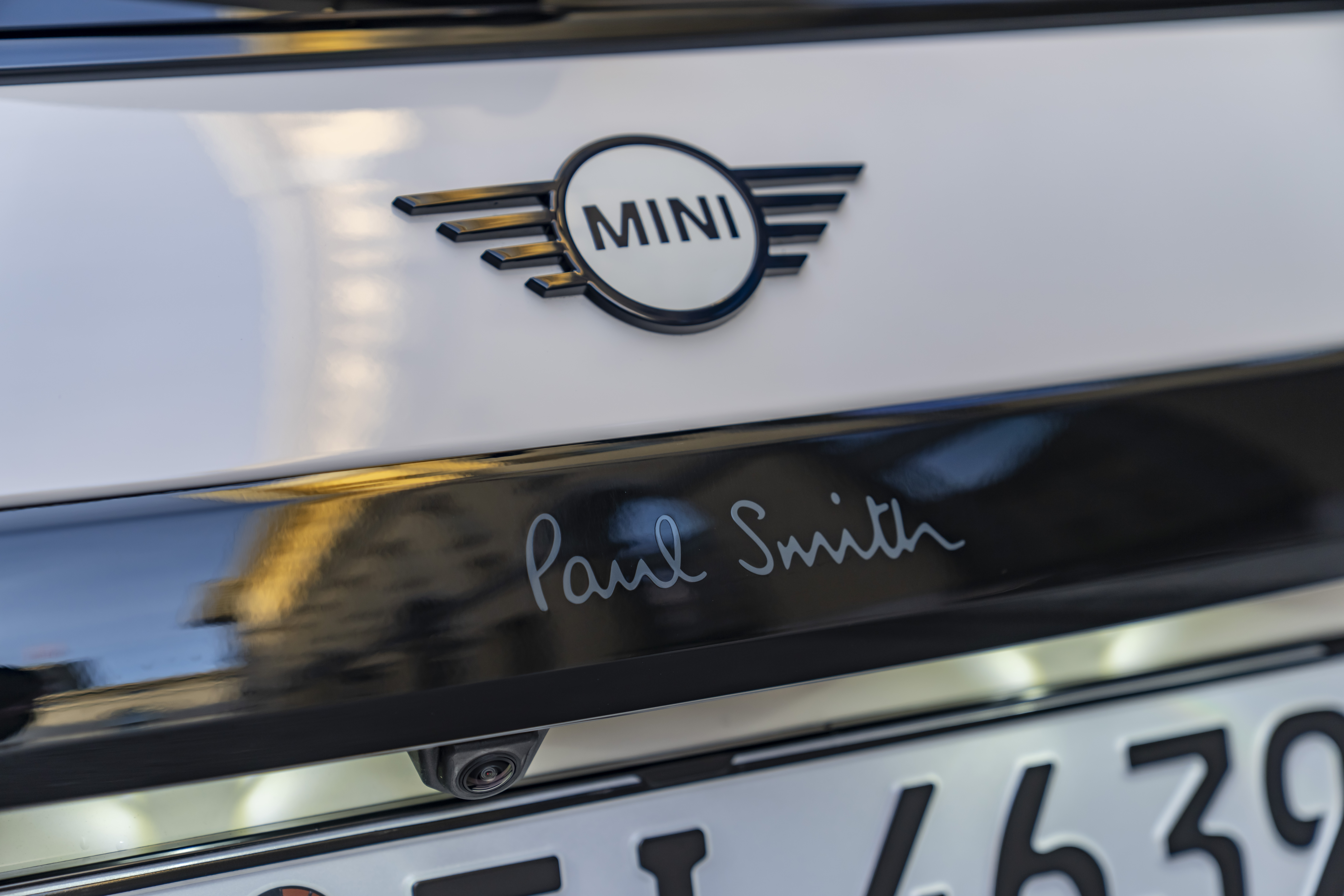 Images of the Paul Smith mini. It's cream with a green roof, and has flashes of Paul Smith flair throughout.