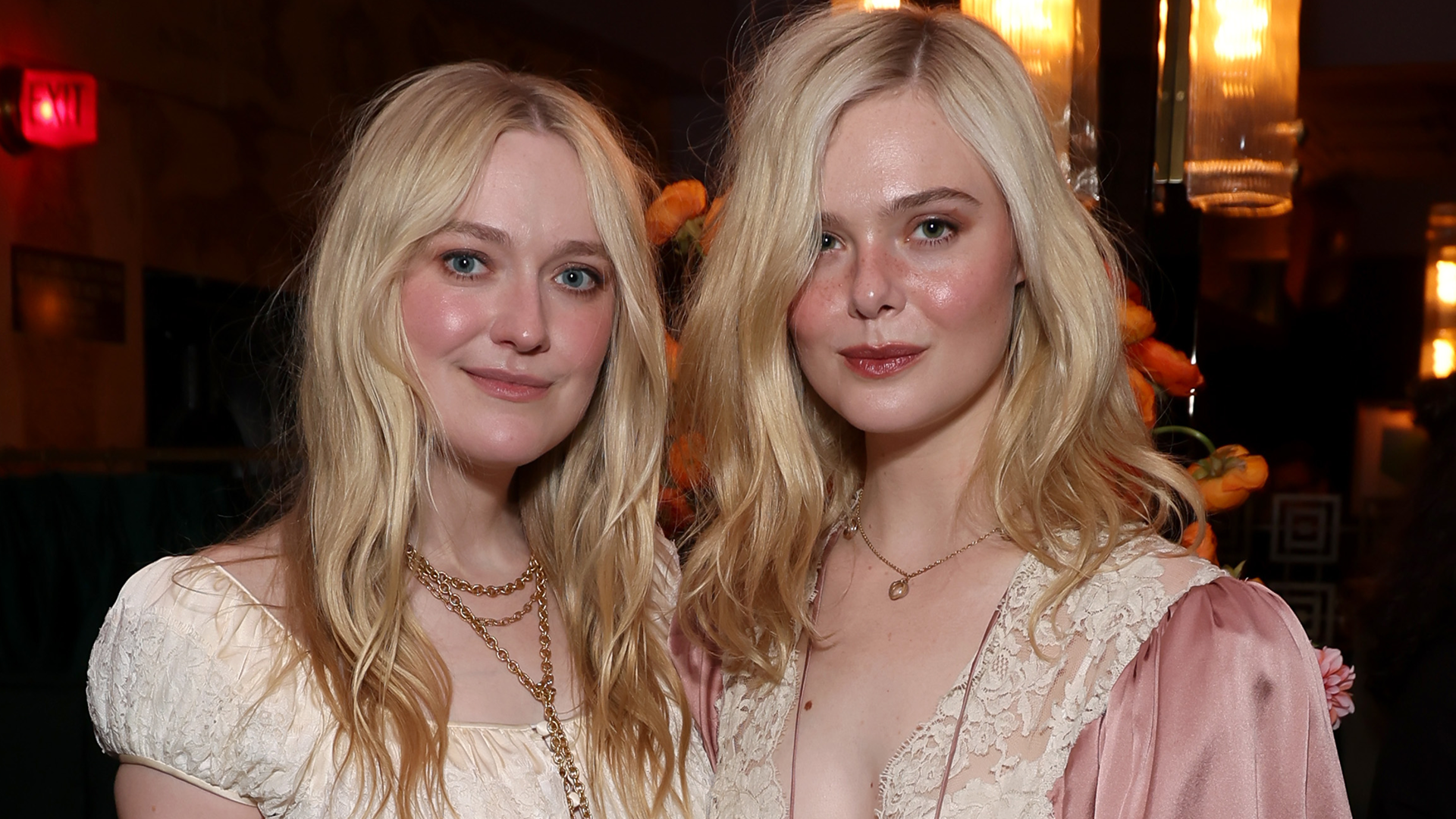 Elle and Dakota Fanning were spotted in two all-black holiday party looks in West Hollywood