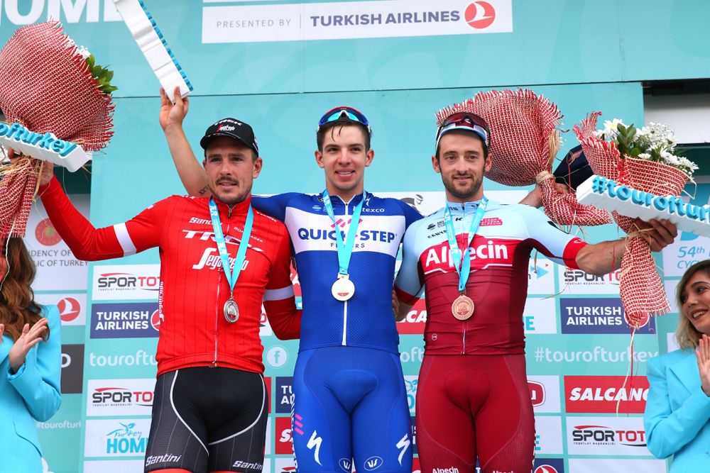 Alvaro Hodeg (QuickStep Floors) takes centre stage on the podium