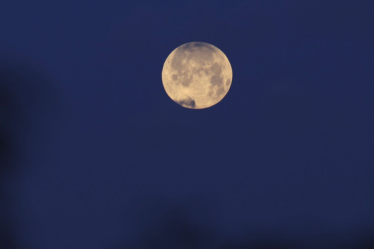The Pink Moon rises over Gaza City early on Thursday morning.