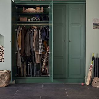 boot room with green wardrobe