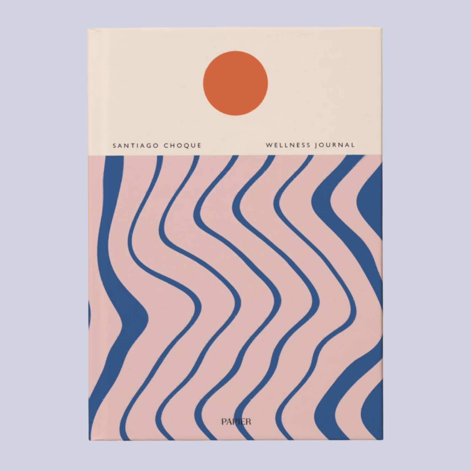 A journal with a sun and waves on the front