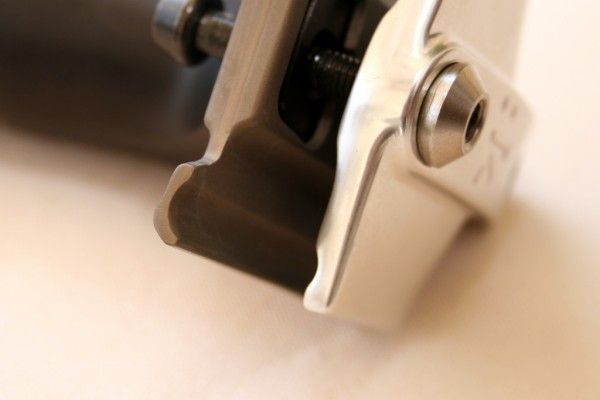 Radiused ends to the clamp reduce stress on the rails