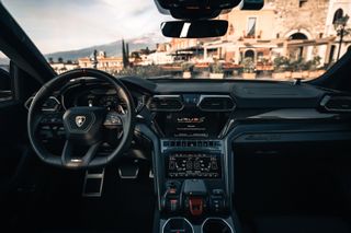 Lamborghini Urus S interior with steering wheel and dashboard