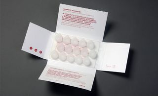 A card with text on and an ice cube tray