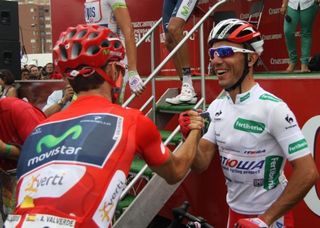 Valverde and Rodriguez share a moment at sign in