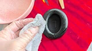 Wiping down sport headphone ear cushion
