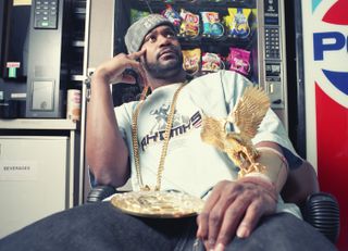 Hip Hop star Ghostface Killah with his 5-pound gold Eagle armband