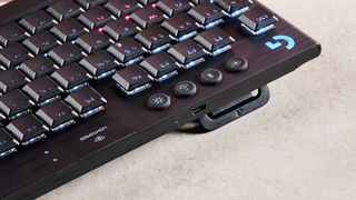 Close-up of USB-C port and feet on Logitech G915 X