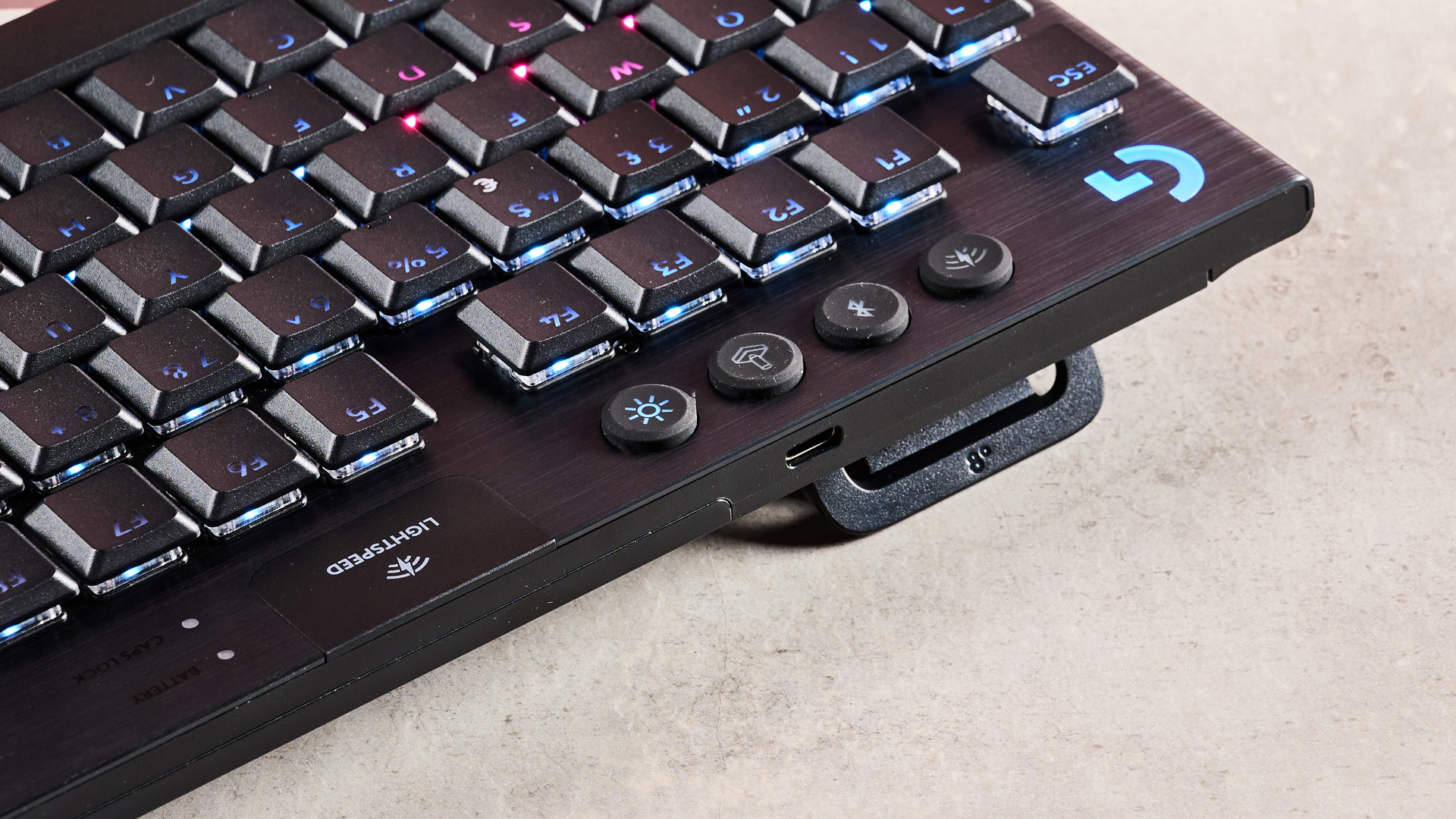 Close-up of USB-C port and foot on Logitech G915 X