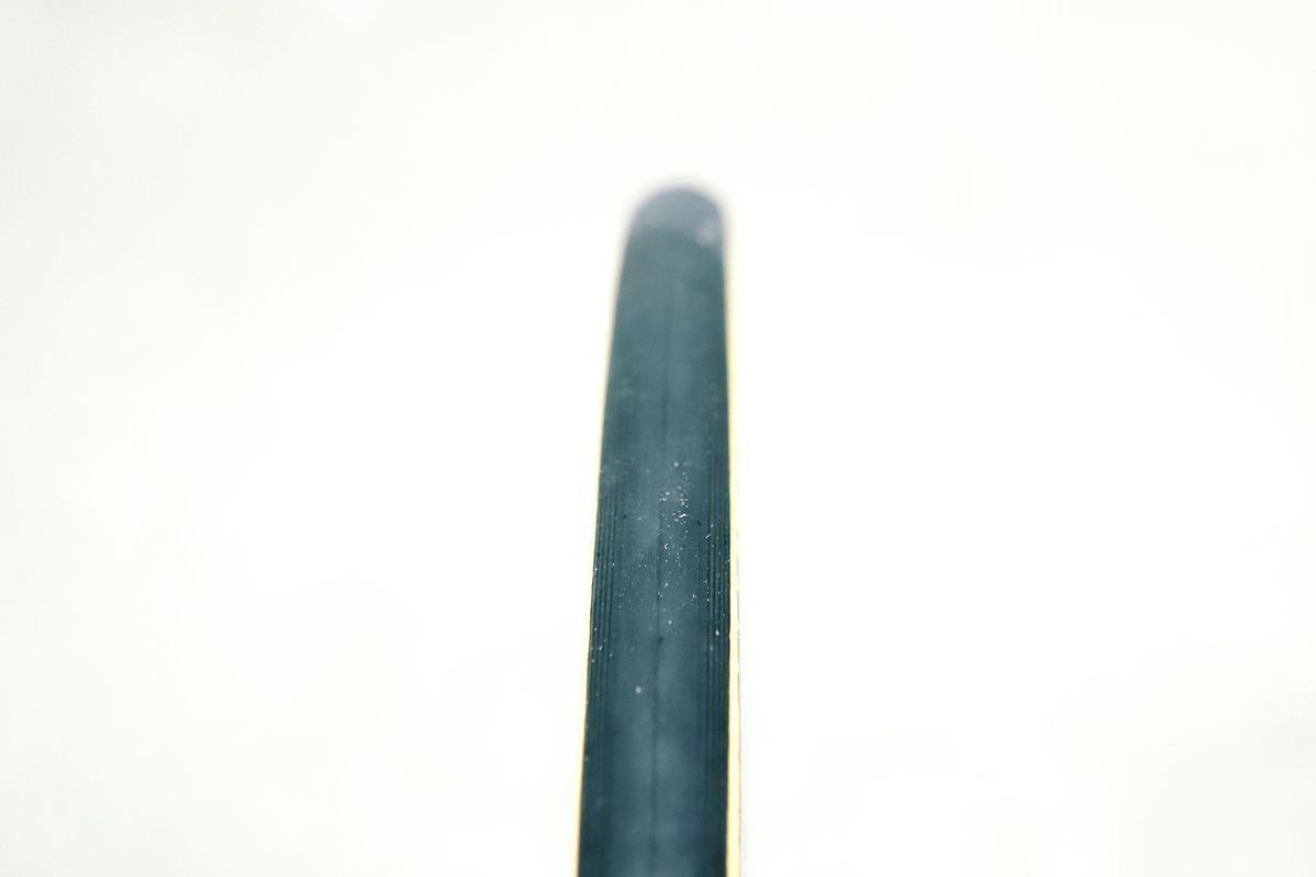 A tan bicycle tyre on a white background