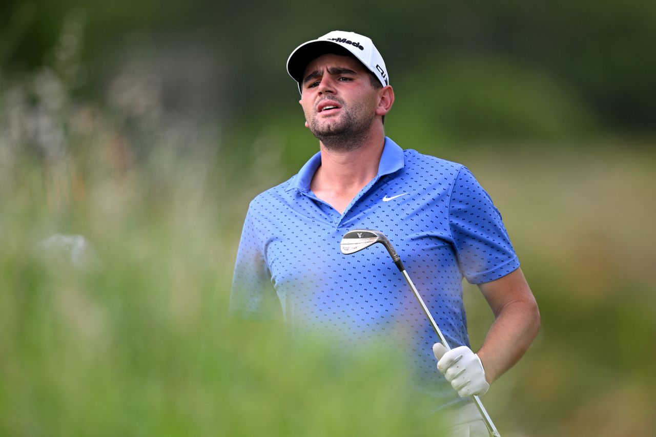 Casey Jarvis watches a wedge shot
