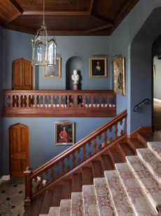 Fig 2: The redecorated entrance hall created in the 1840s. The ceiling is grained. Entrance hall and staircase, Dunvegan Castle ©Paul Highnam for Country Life