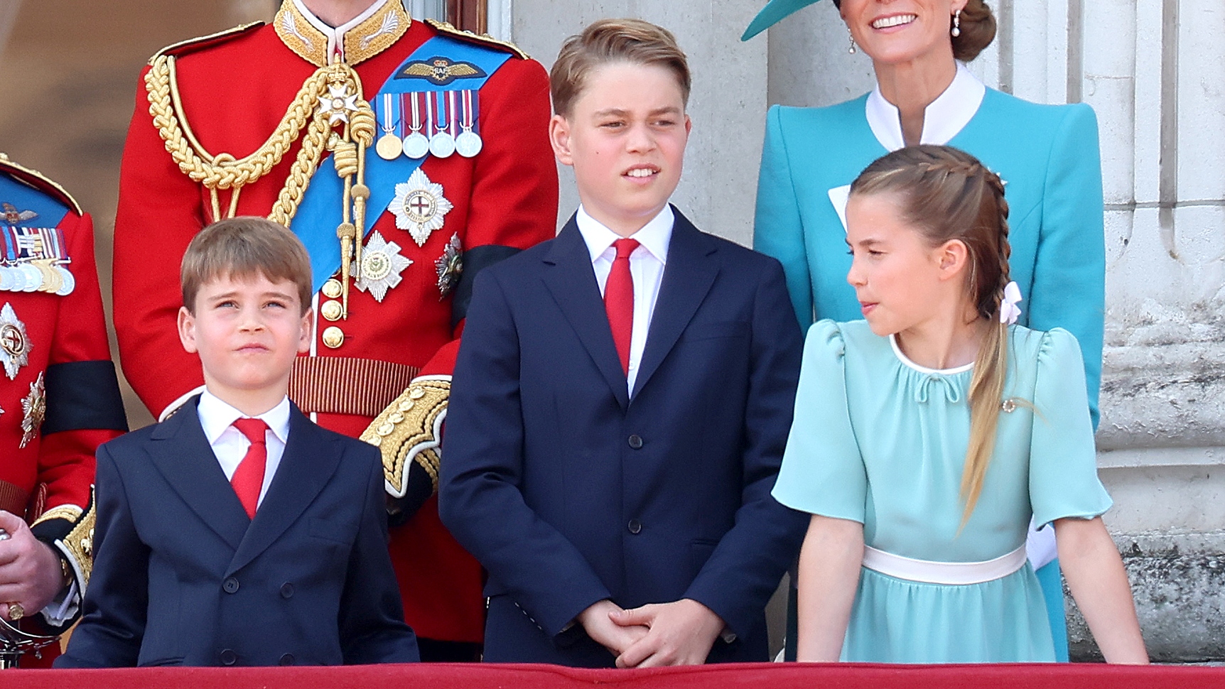 Prince George, Princess Charlotte and Prince Louis stand on the balcony of Buckingham Palace during Trooping The Colour 2025 on June 14, 2025
