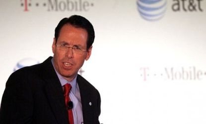 AT&T CEO Randall Stephenson announces Sunday that the wireless giant will buy rival T-Mobile, which means the latter's customers will get the iPhone... eventually. 