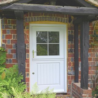 white stable front door with glazing