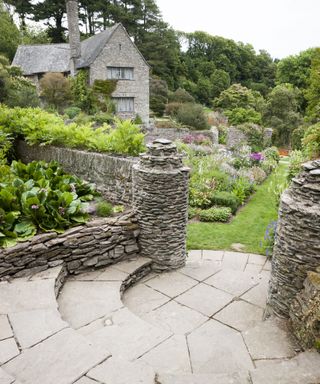 natural, local hard landscaping materials used in arts and crafts garden of Coleton Fishacre National Trust