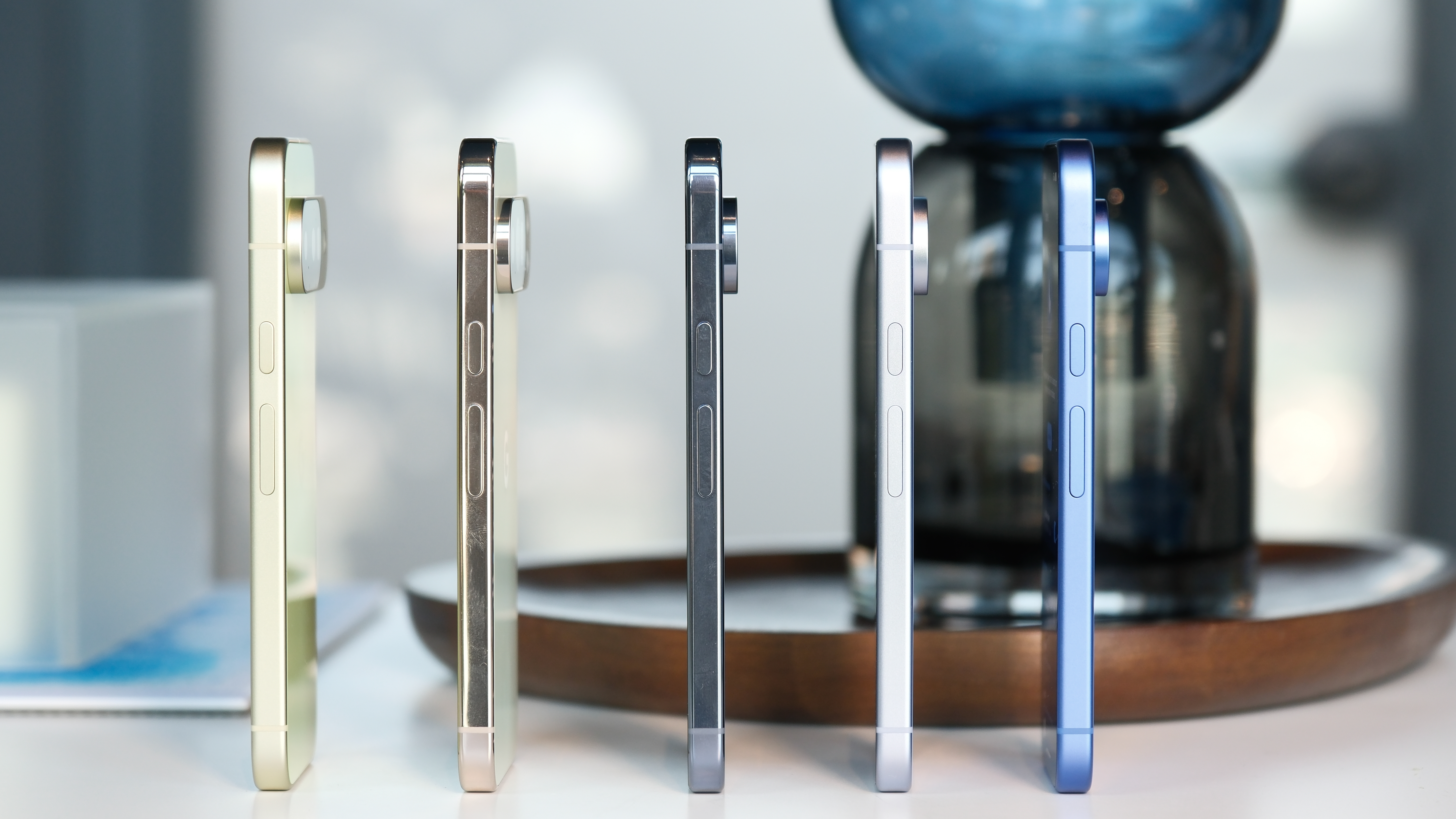 Google Pixel 10 and Pixel 10 Pro devices from the side showing side buttons