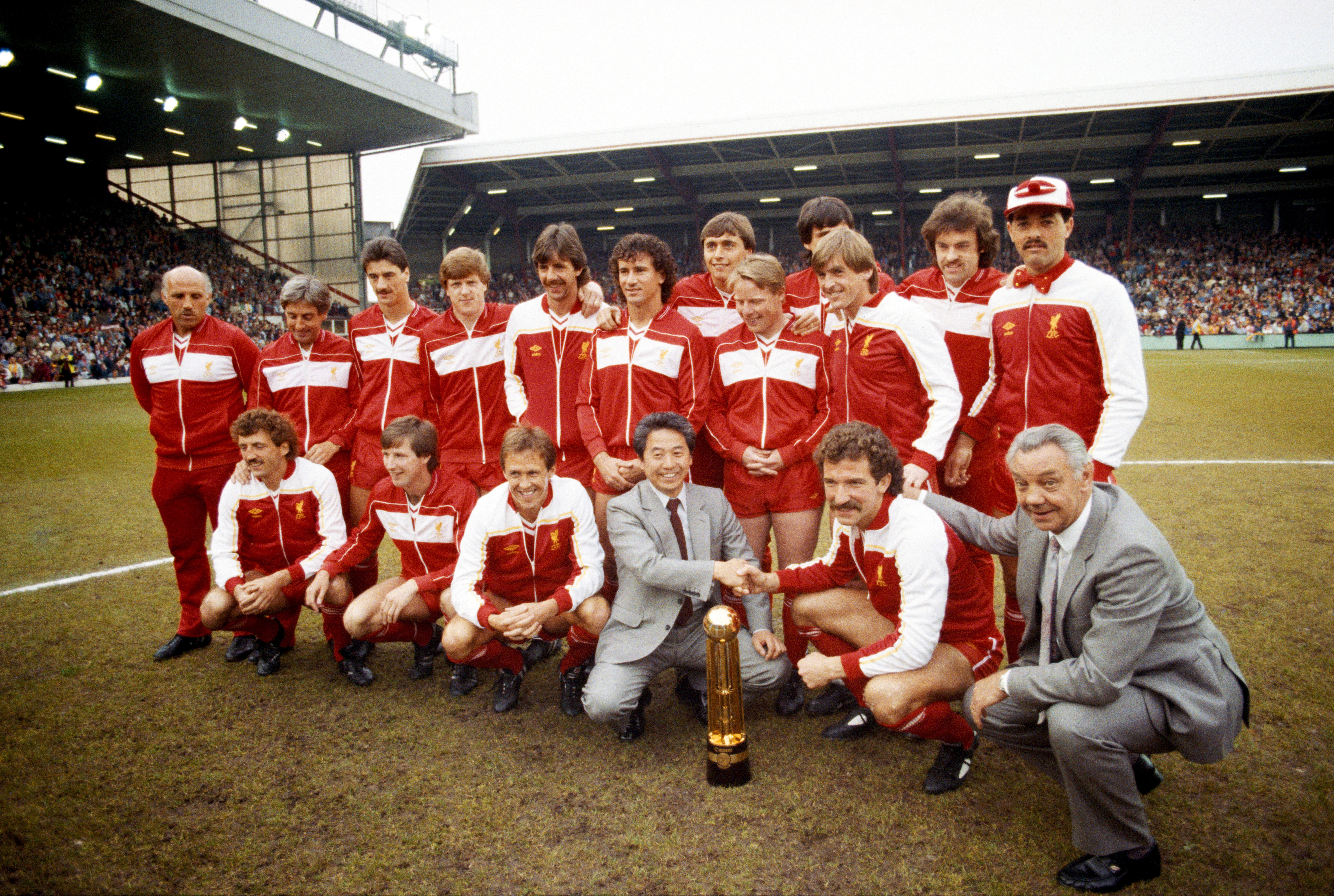 Liverpool players and staff celebrate after winning the First Division title in May 1984.