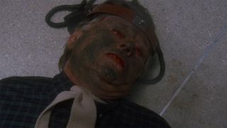 Chucky burns Dr. Ardmore in Child's Play