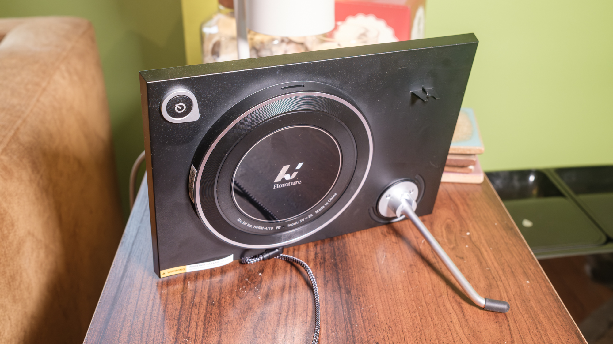 A Homture Magic Frame on a side table