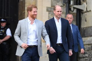 Prince Harry and Prince William, Duke of Cambridge walking ahead of the royal wedding of Prince Harry and Meghan Markle on May 18, 2018 in Windsor, England.
