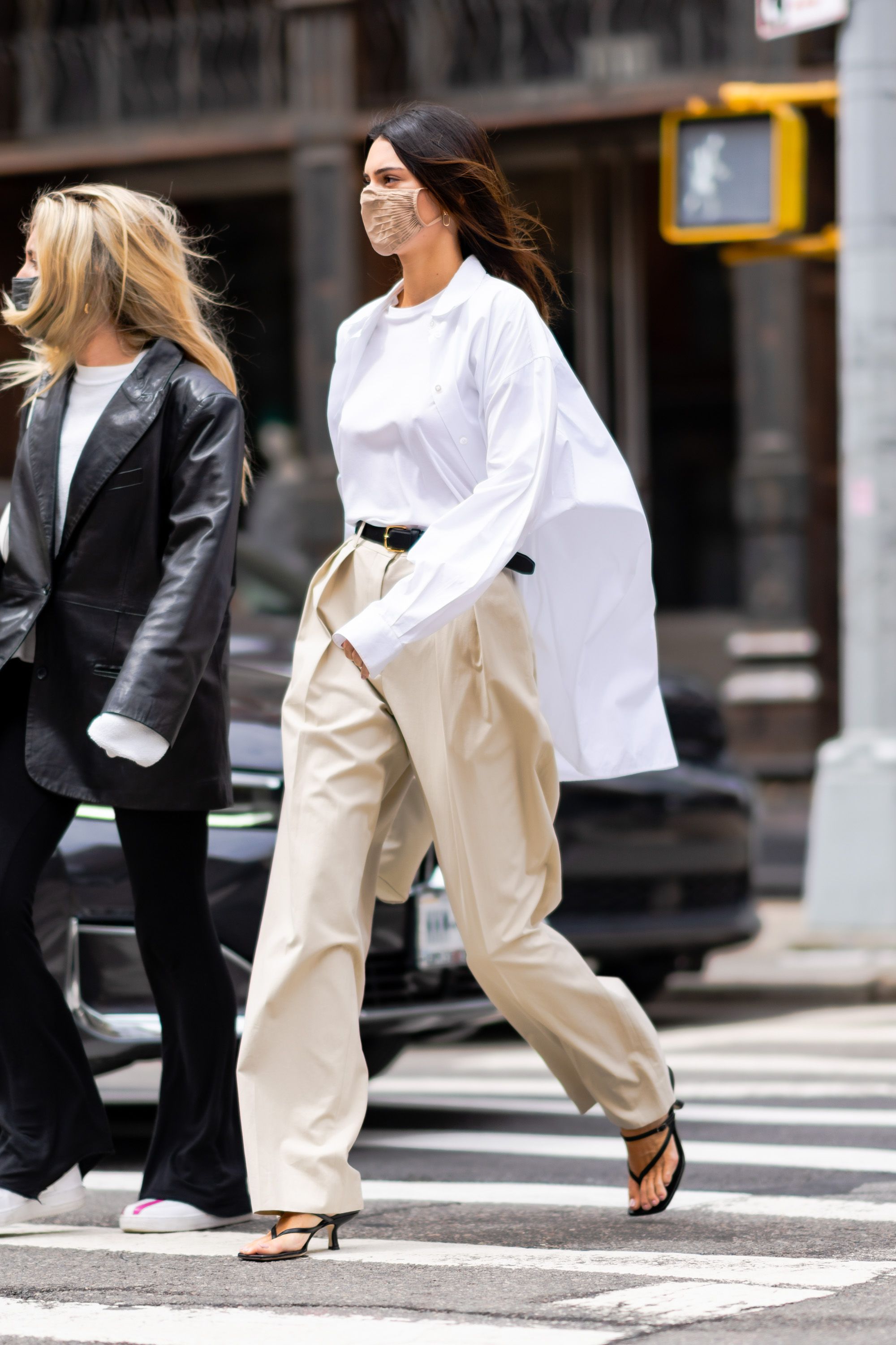 An image of Kendall Jenner wearing wide-leg trousers.
