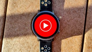 The YouTube Music logo on a Wear OS smartwatch