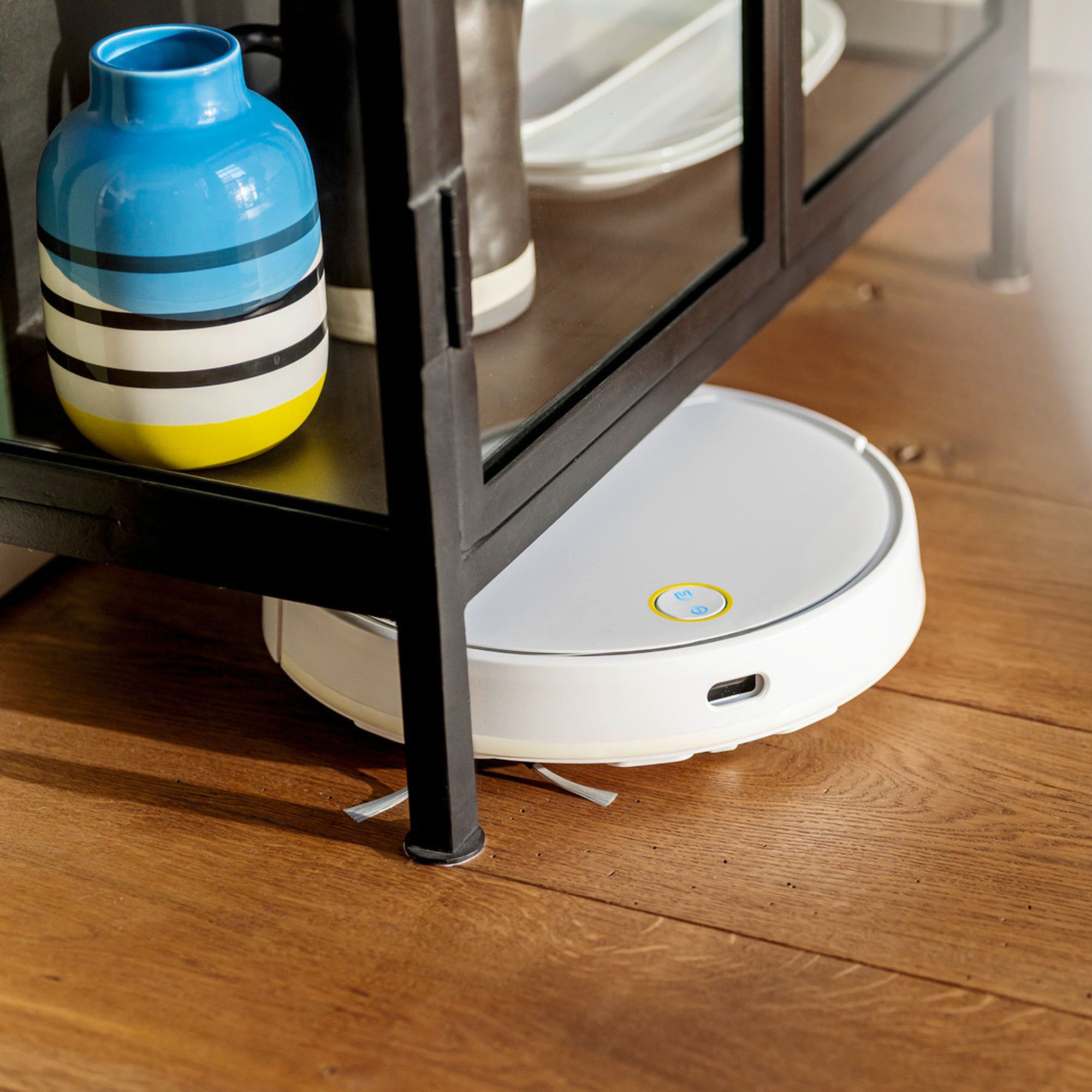 Ka&amp;#776;rcher RCV 3 Robot Vacuum Cleaner cleaning under a shelf