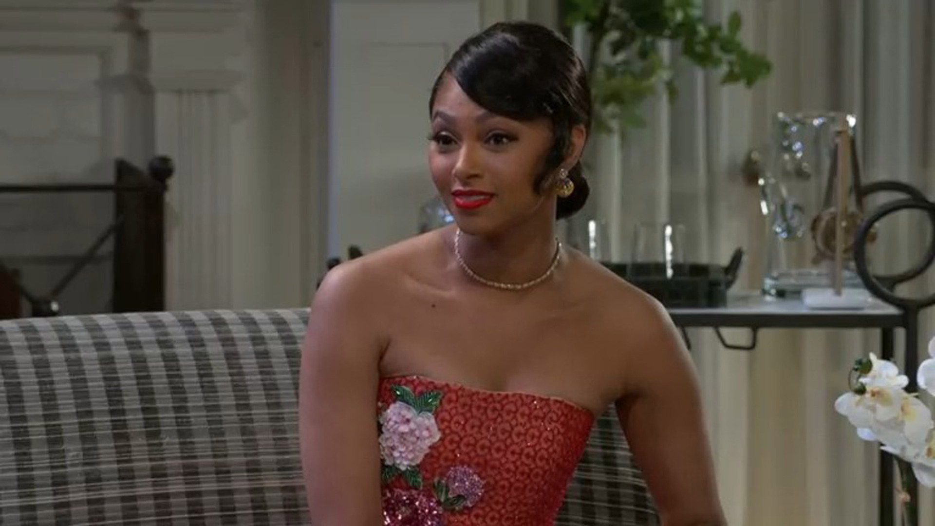 Colby Muhammad as Kat smiling in Beyond the Gates