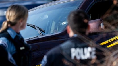 MINNEAPOLIS, MINNESOTA - JANUARY 07: A bullet hole is seen in the windshield of a vehicle involved in a shooting by an ICE agent during federal law enforcement operations on January 07, 2026 in Minneapolis, Minnesota. According to federal officials, the agent, "fearing for his life" killed a woman during a confrontation in south Minneapolis. (Photo by Stephen Maturen/Getty Images)