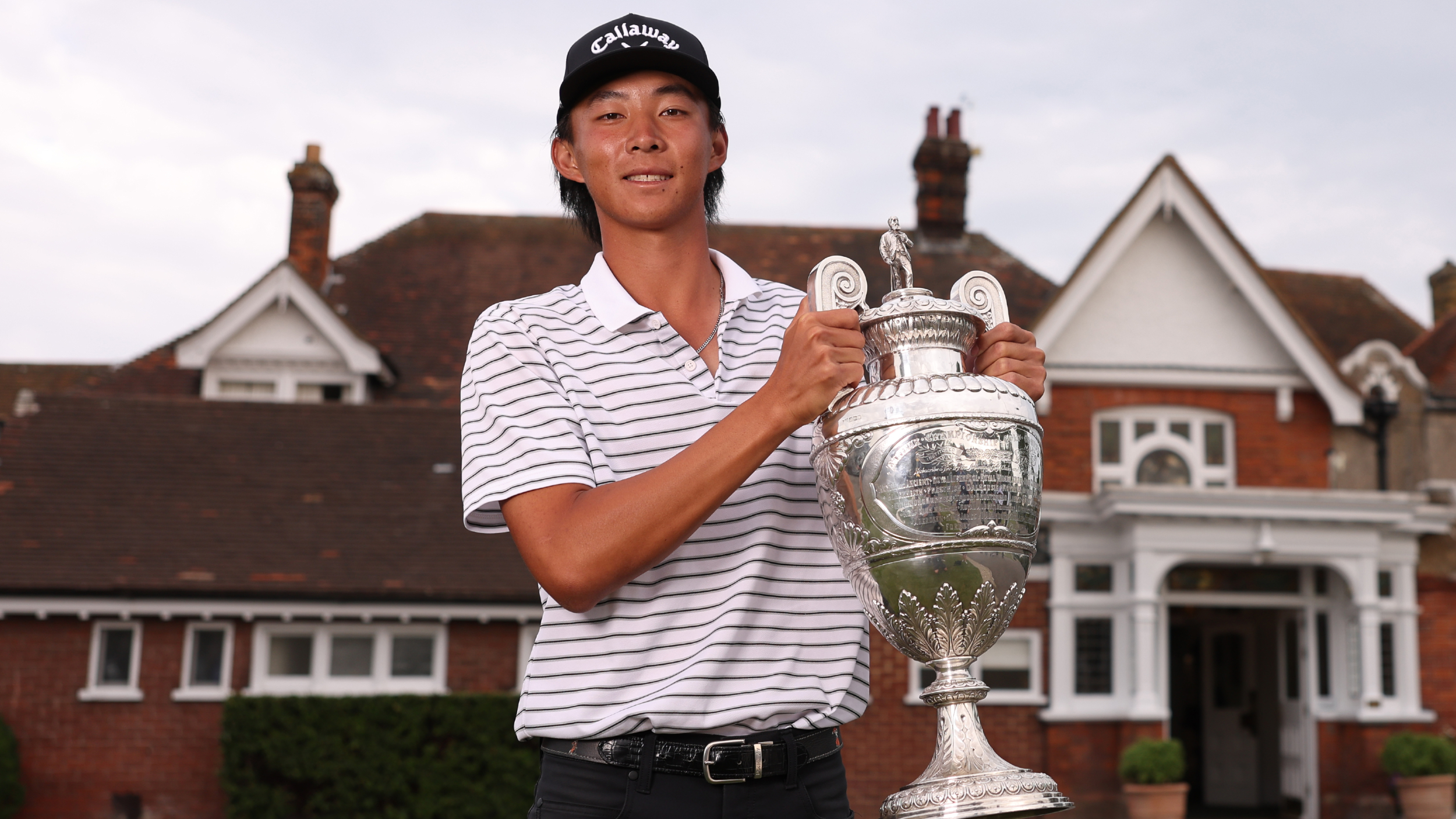 Ethan Fang with The Amateur trophy
