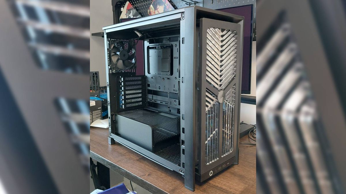 The Corsair Frame 4000X PC case seen at various stages of a PC build. This is a modular, mid-tower case with lots of options for customisation.