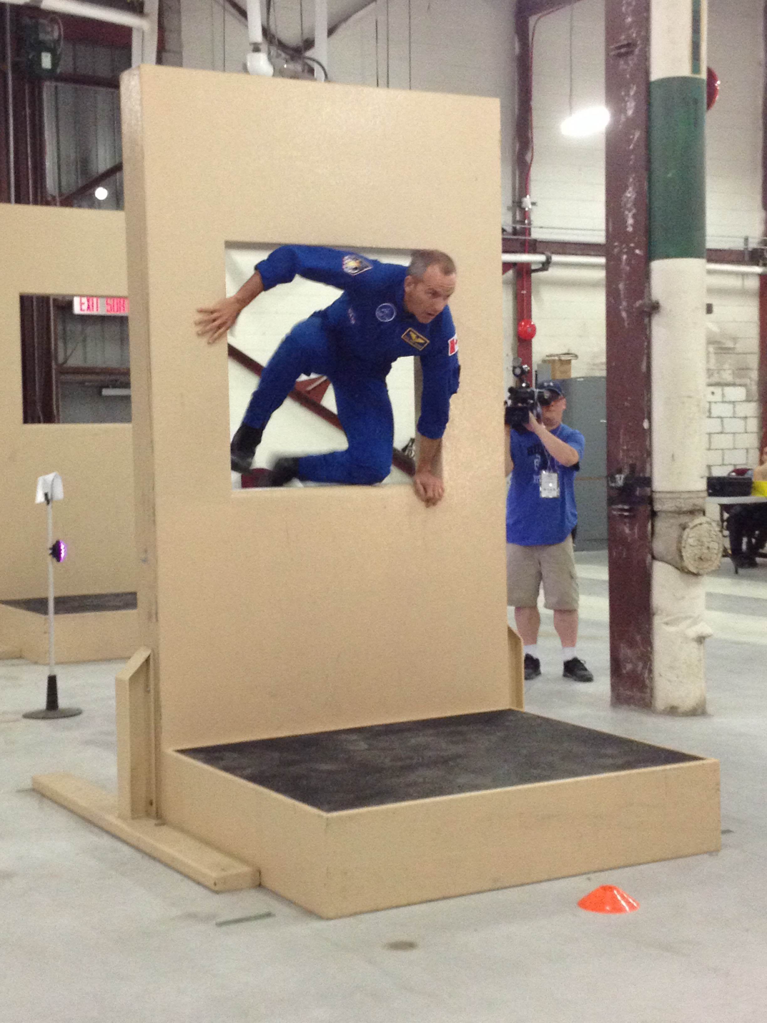 David Saint-Jacques Leaps Through an Obstacle 