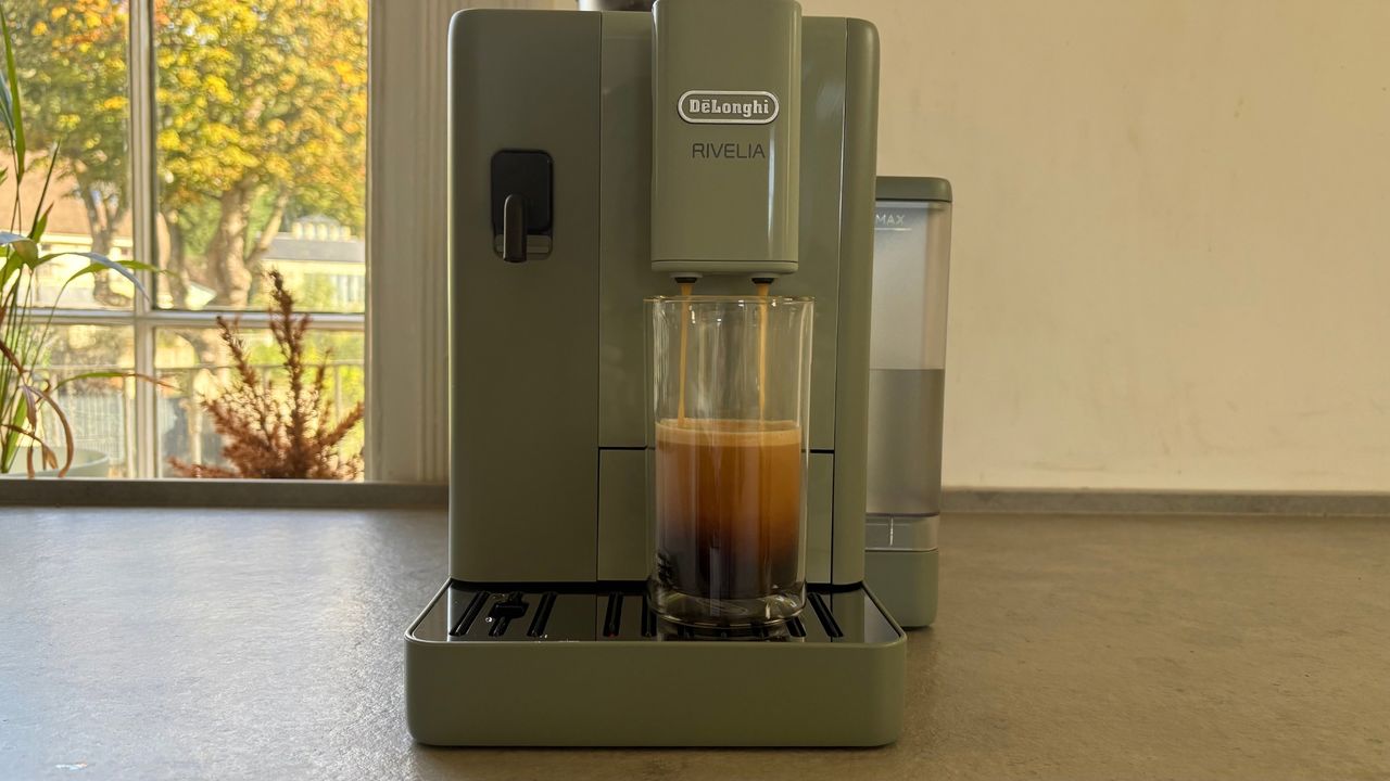 De'Longhi Rivelia Start Coffee Machine on the counter making a coffee