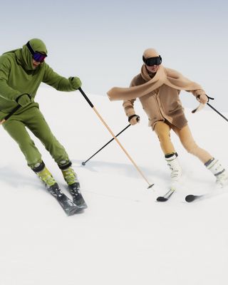Skiiers on ski slope wearing colourful Extreme Cashmere knitwear