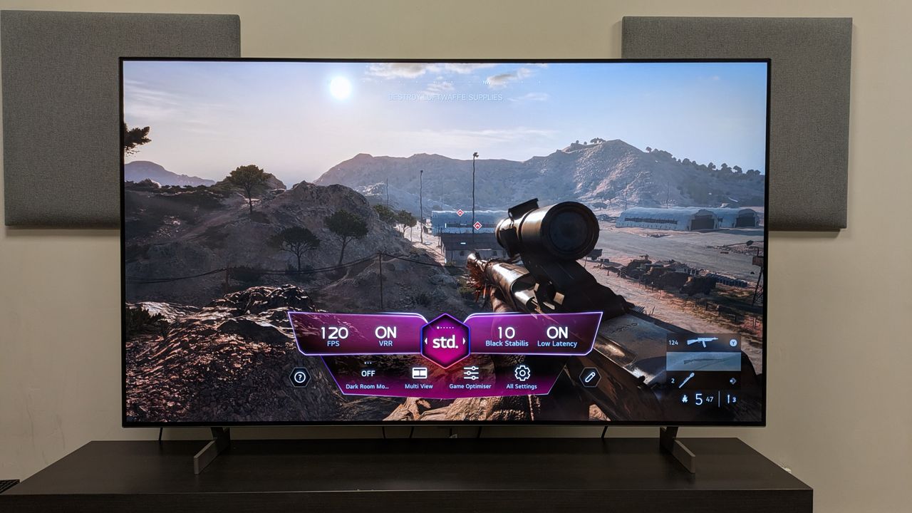 LG B6 OLED TV with a shot of Battlefield V on screen with the game optimizer menu on top