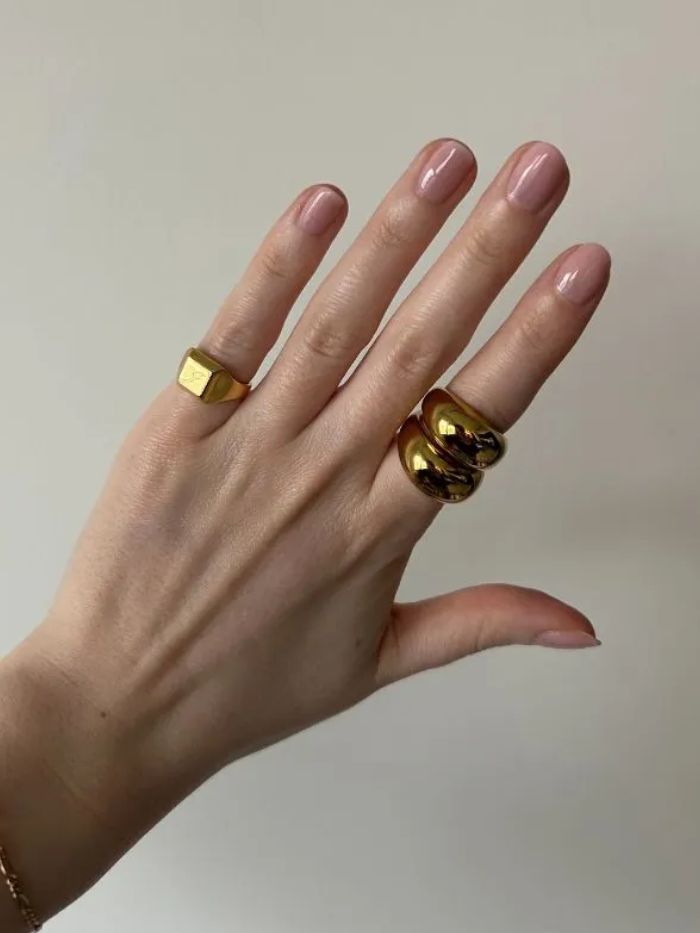 A picture of junior beauty editor Grace Lindsay&#039;s hand after testing the best nail top coats